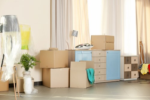 Moving boxes and furniture being prepared for a Hackney relocation