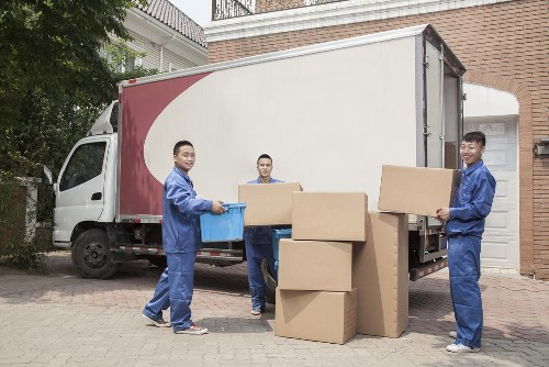 House and office moving services in Hackney with packed boxes and furniture