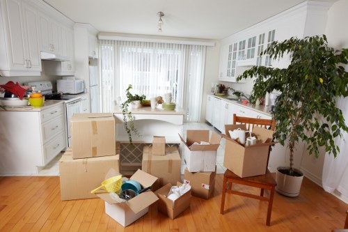 Packed office equipment ready for relocation services in Hackney