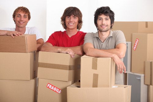 Professional movers handling commercial equipment in Hackney