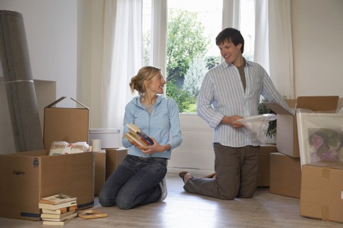 A local moving crew loading a van for house removals in Hackney