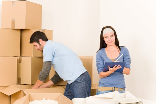 Local Hackney movers packing boxes for a residential move