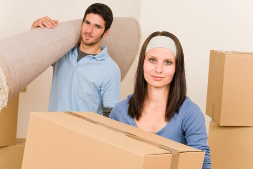 Office furniture being transported during a Hackney business move
