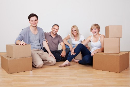 Supervisors and workers maintaining safe practices during a move